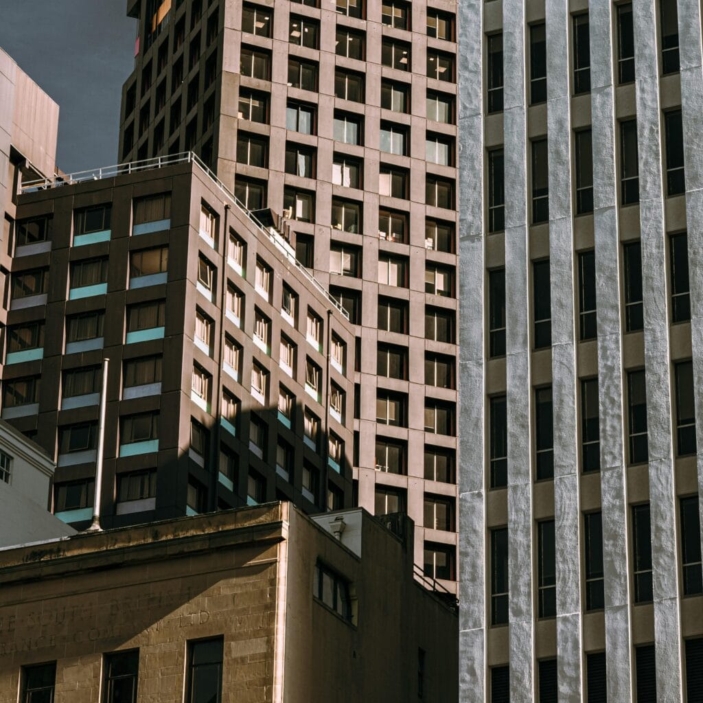 Cluster of high-rise buildings in a bustling urban downtown area